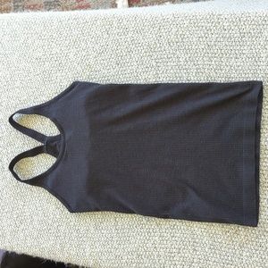 Used Lululemon black tank with built in bra, size S